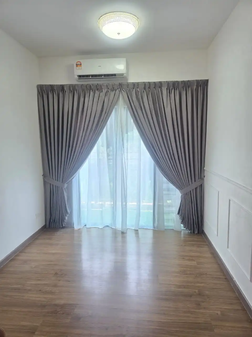 Sheer curtains for bright living space in Mont Kiara by Khan Amin Enterprise